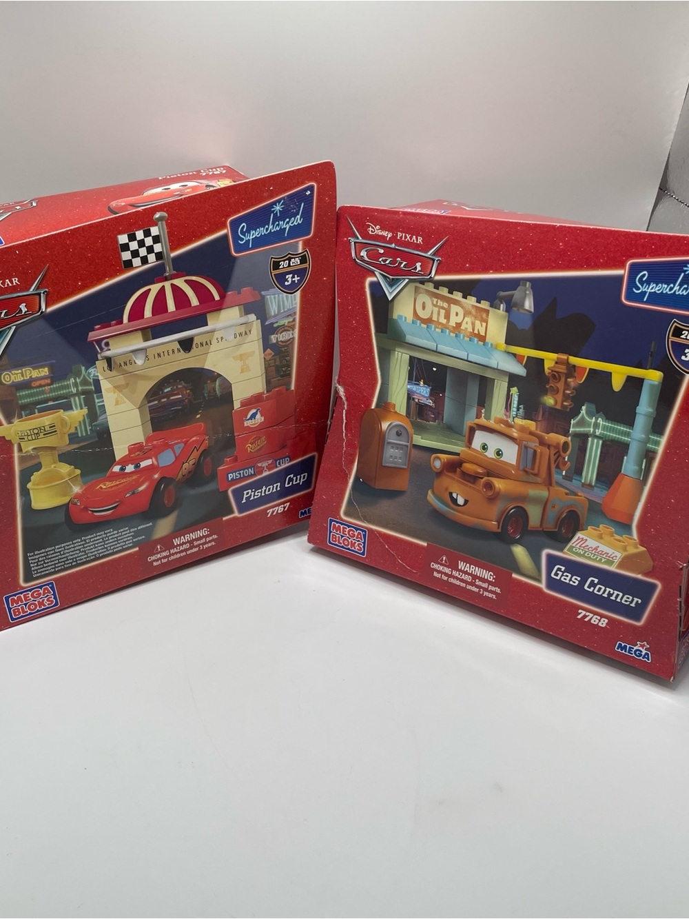 Disney Cars Playset Duo — Red and Brown Vehicles with Themed Buildings